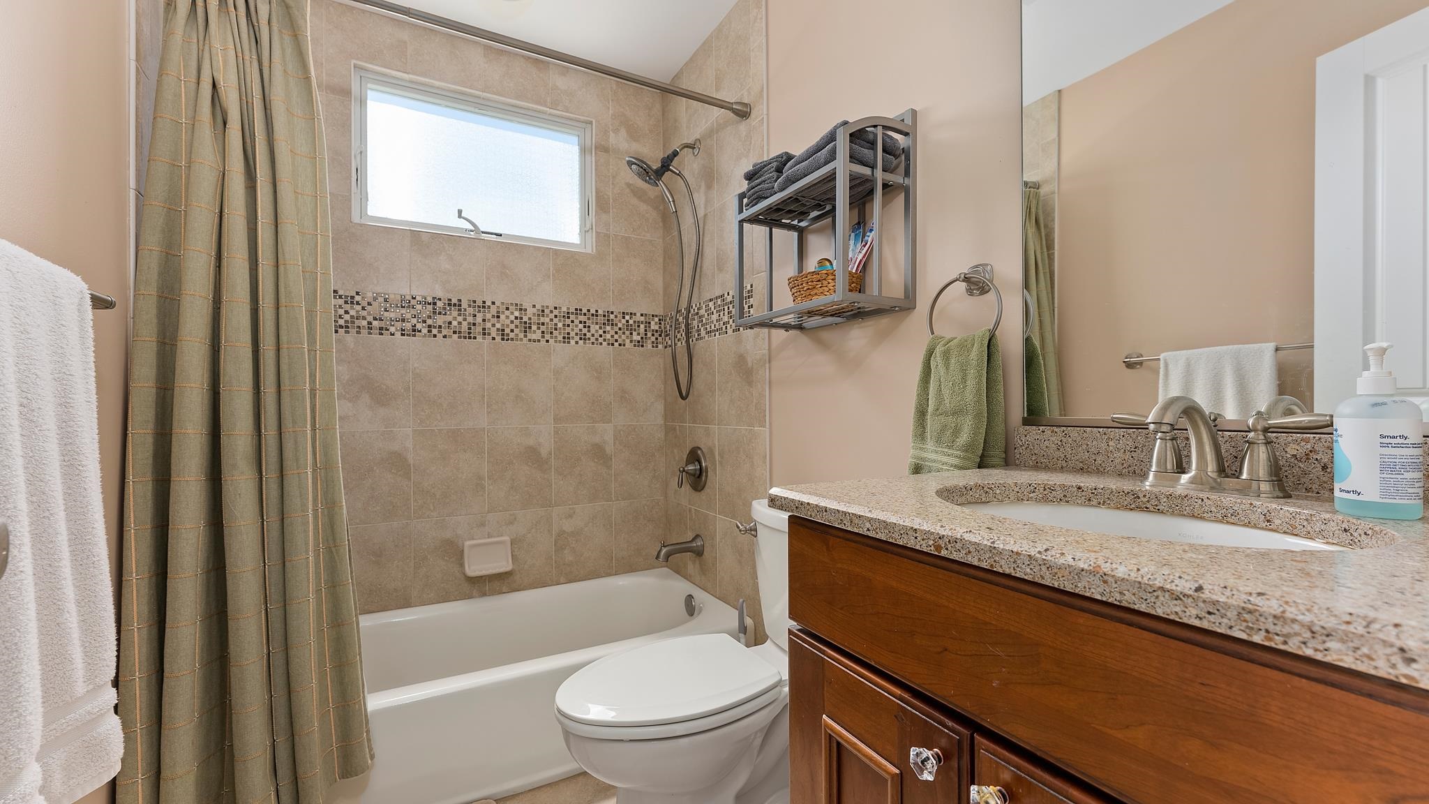 22 80th Street, Unit WEST Sea Isle City, NJ 08243 - Photo 28 of 32 a bathroom with a granite countertop sink toilet and shower