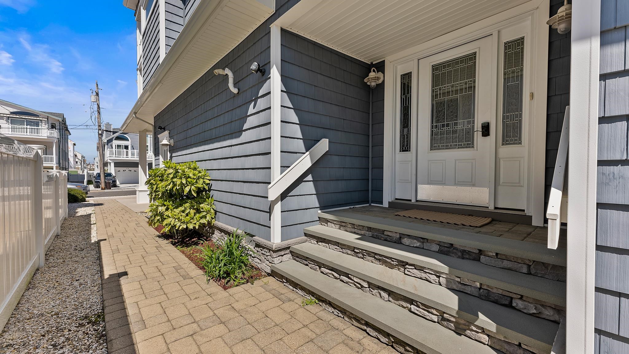 22 80th Street, Unit WEST Sea Isle City, NJ 08243 - Photo 30 of 32 a front view of a house