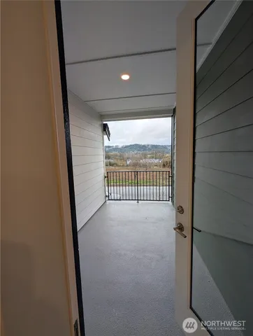 a view of a lake with mountains in the background