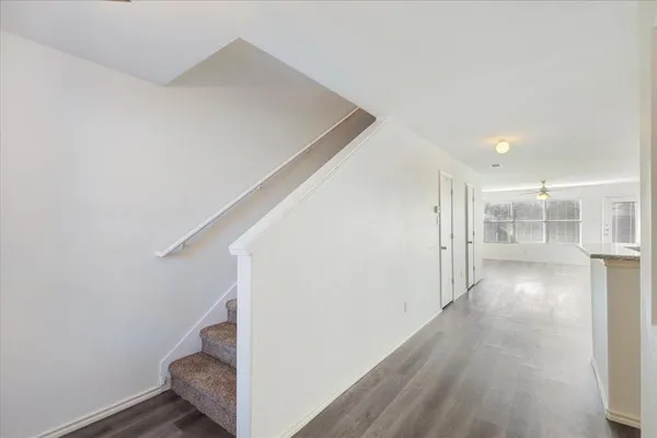 a view of hallway with stairs