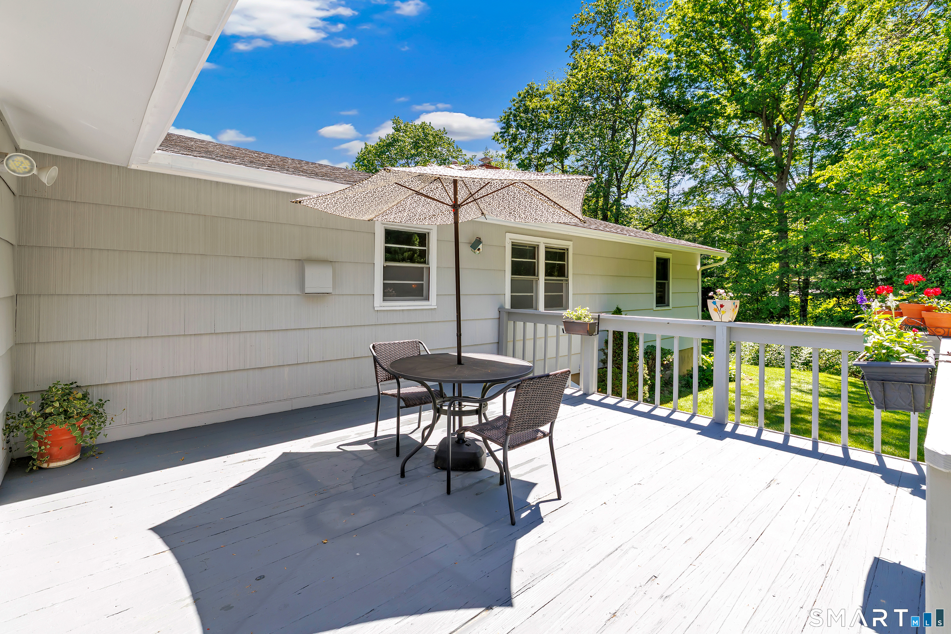 223 Wheeler Road Monroe, CT 06468 - Photo 24 of 35 a patio with table and chairs