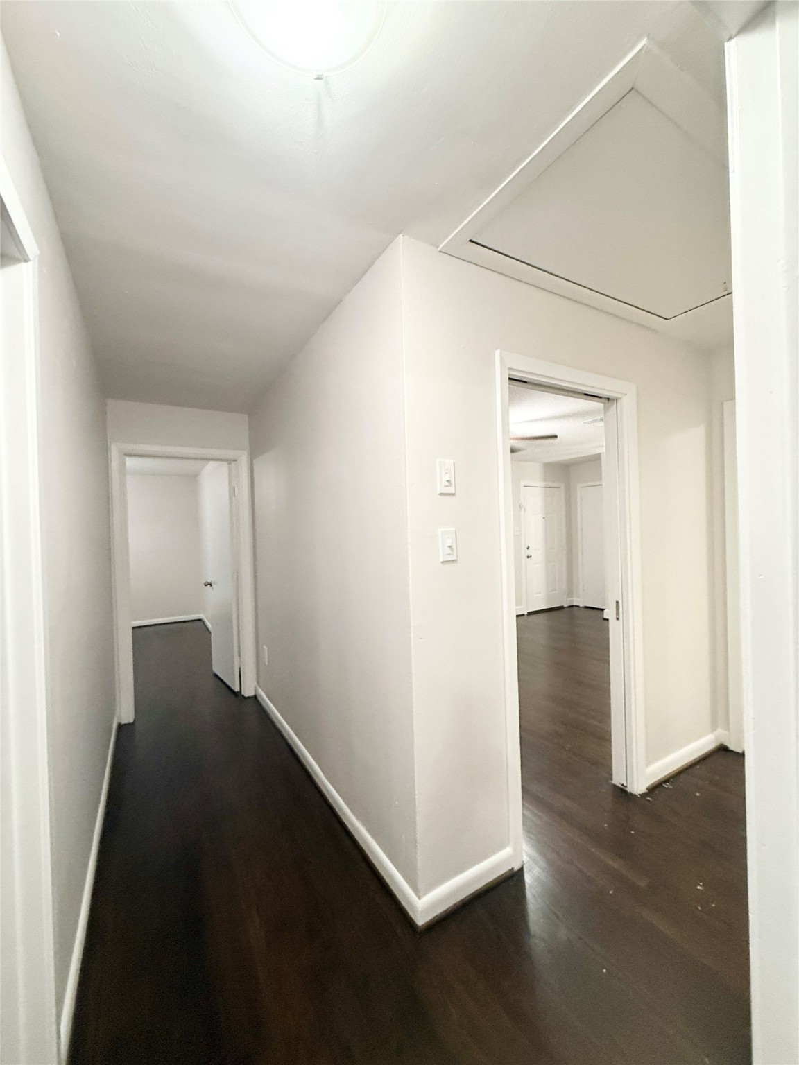 913 Wimberly Street Angleton, TX 77515 - Photo 11 of 24 an empty room with wooden floor & windows