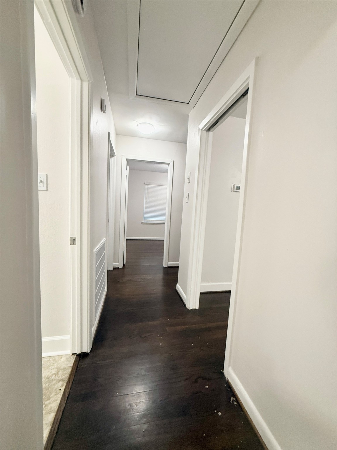 913 Wimberly Street Angleton, TX 77515 - Photo 14 of 24 a view of a hallway with wooden floor