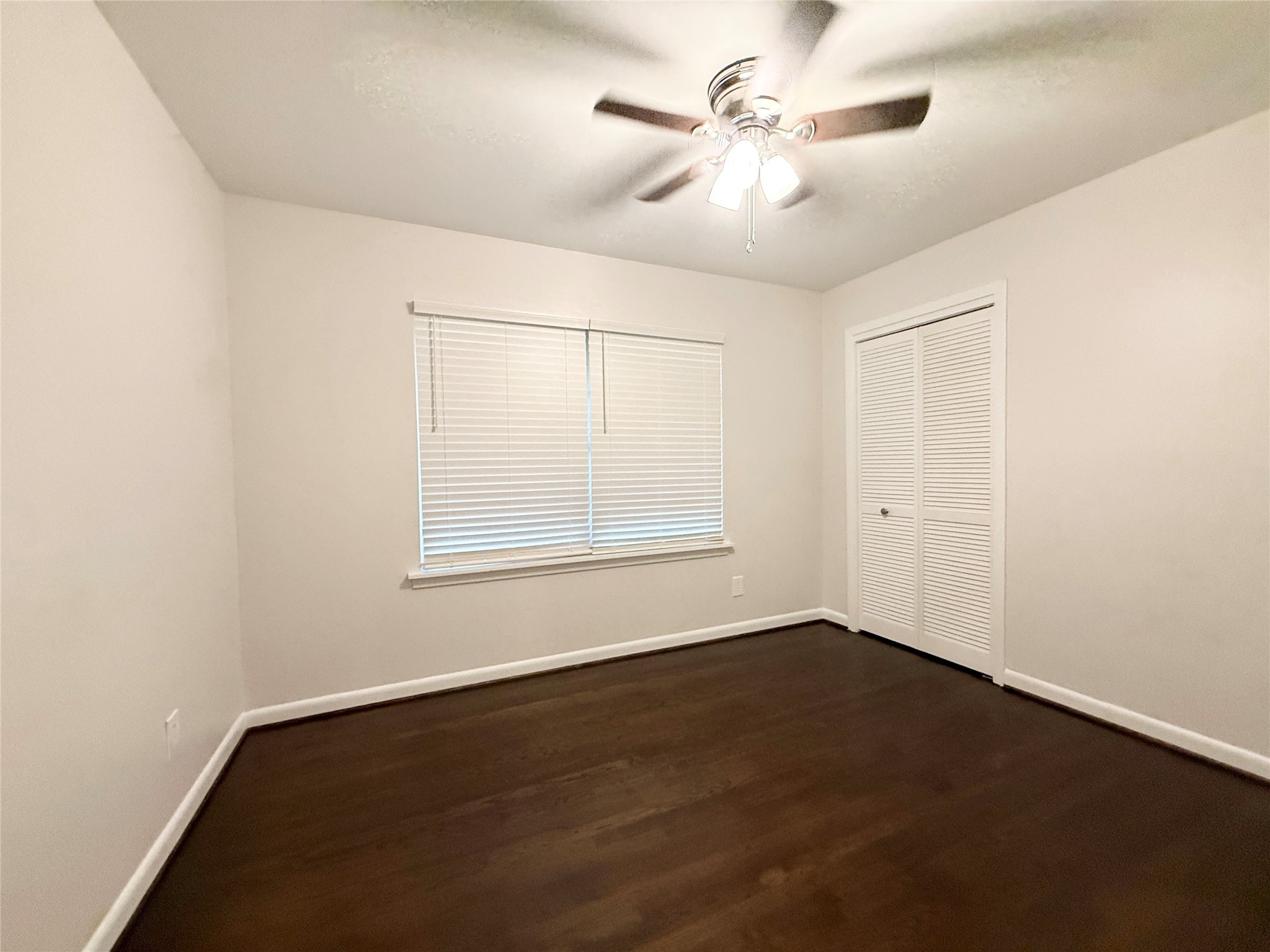 913 Wimberly Street Angleton, TX 77515 - Photo 15 of 24 a view of an empty room with a window