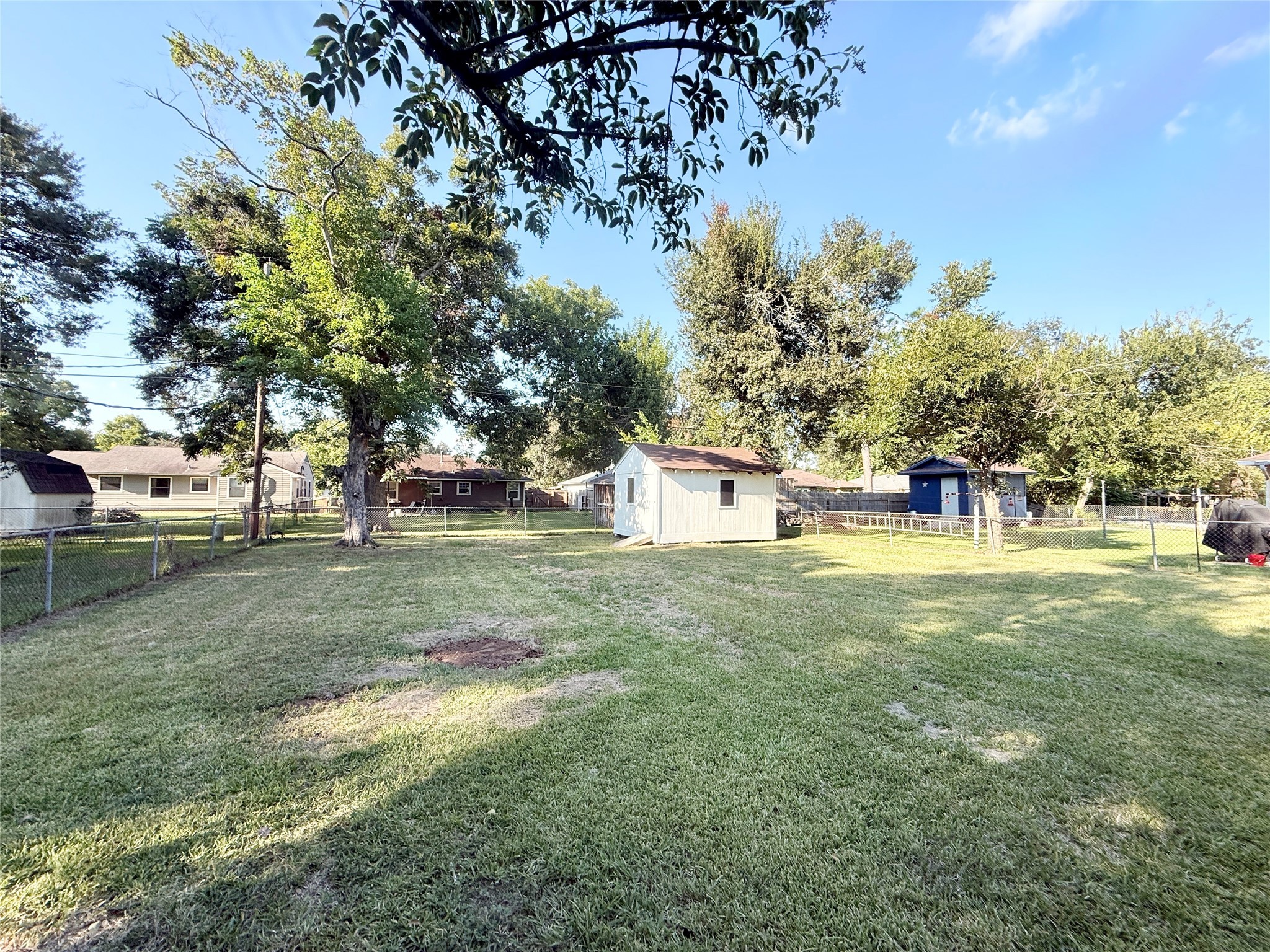 913 Wimberly Street Angleton, TX 77515 - Photo 24 of 24 a view of a park with large trees
