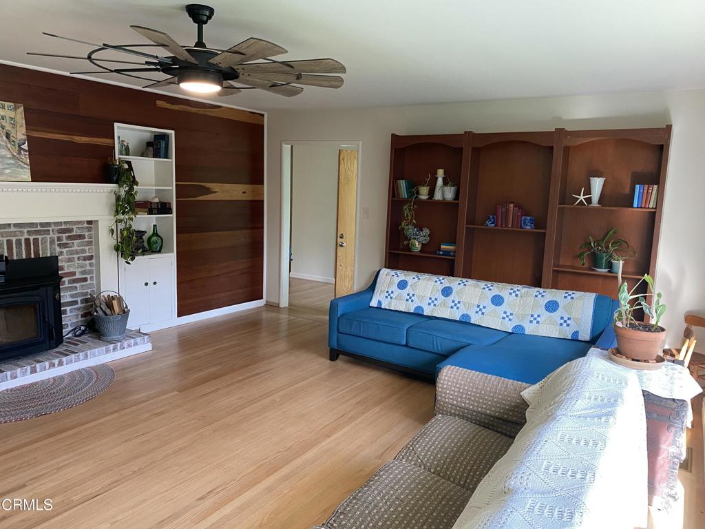 31400 Sherwood Road Fort Bragg, CA 95437 - Photo 27 of 55 a room with furniture and wooden floor