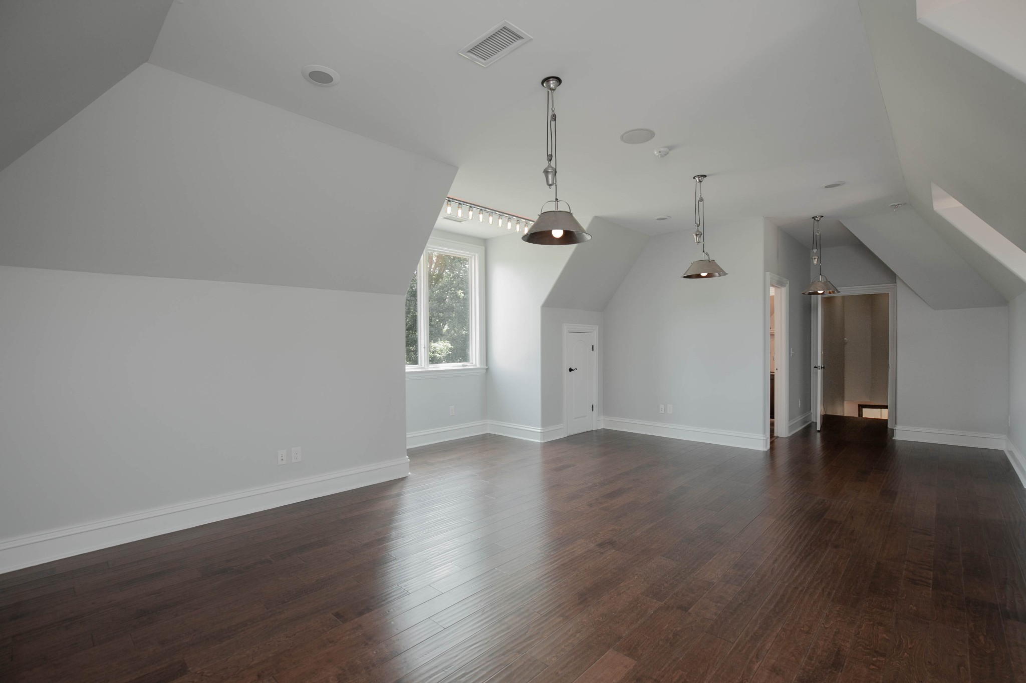 3747 Armstrong Road Springfield, TN 37172 - Photo 21 of 50 a view of an empty room with a window and wooden floor