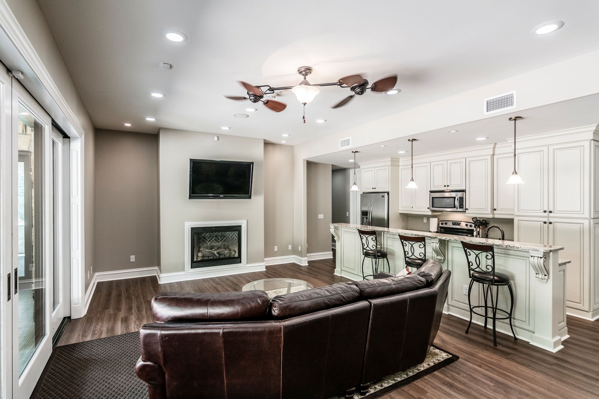 3747 Armstrong Road Springfield, TN 37172 - Photo 37 of 50 a living room with furniture a fireplace and a flat screen tv