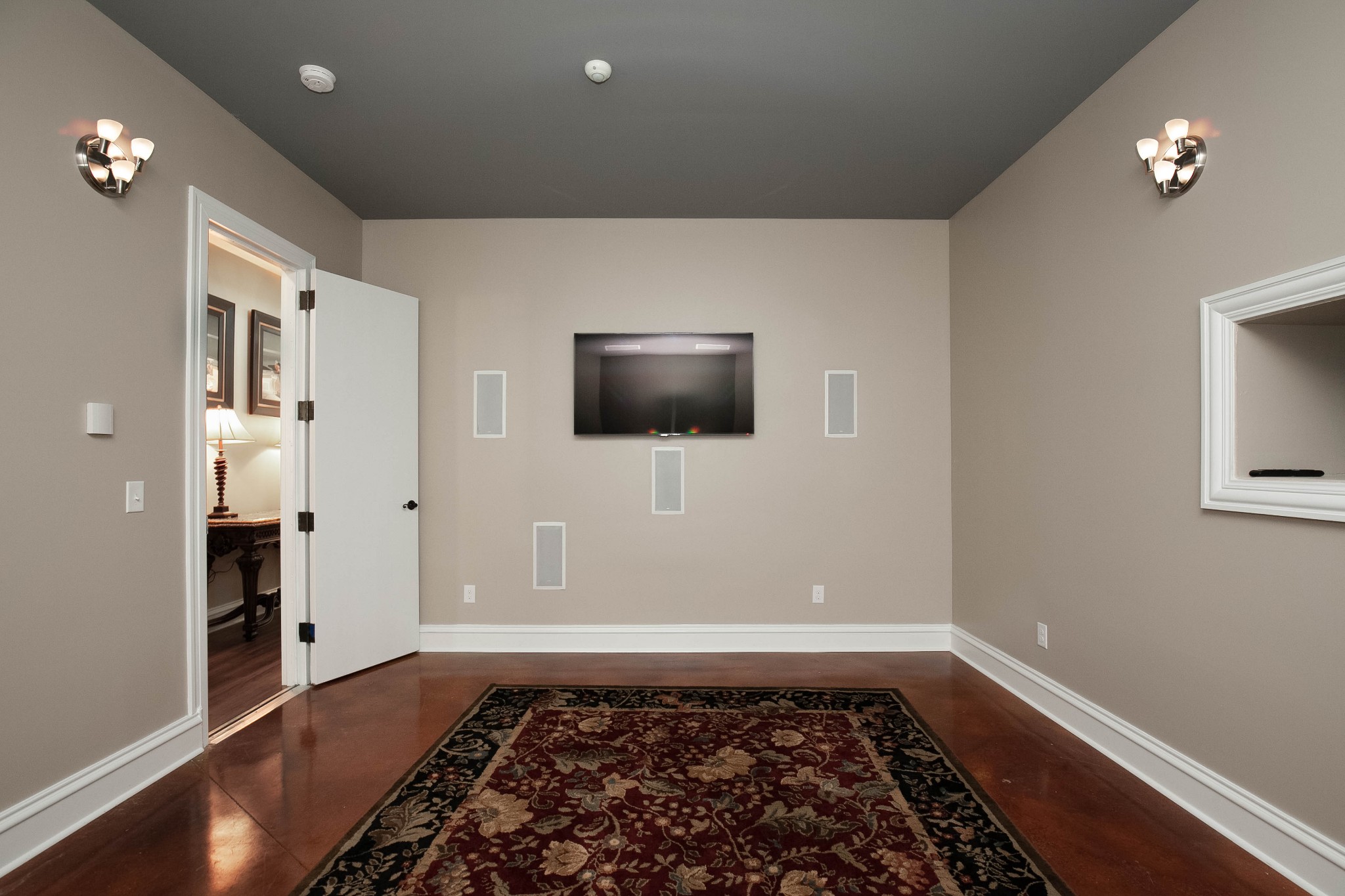 3747 Armstrong Road Springfield, TN 37172 - Photo 41 of 50 a view of a livingroom with wooden floor and flat screen tv