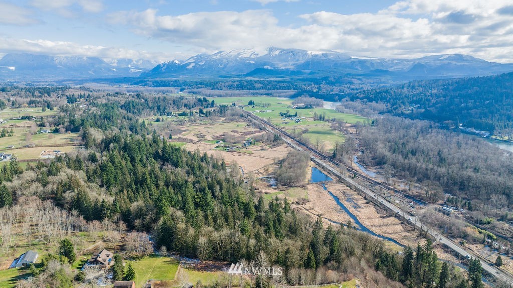 26224 Fern Bluff Road Monroe, WA 98272 - Photo 16 of 27 a view of a city with lush green forest