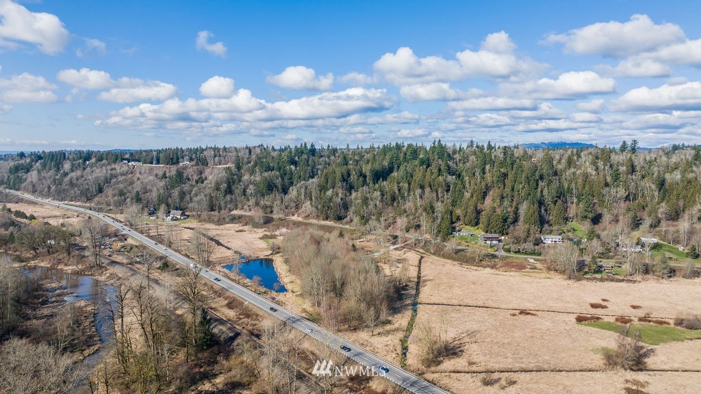 26224 Fern Bluff Road Monroe, WA 98272 - Photo 5 of 27 a view of a dry yard with wooden fence