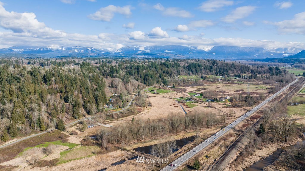 26224 Fern Bluff Road Monroe, WA 98272 - Photo 6 of 27 a view of a yard with wooden fence