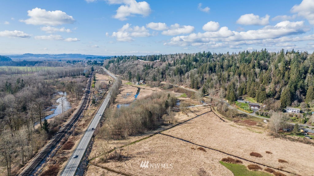 26224 Fern Bluff Road Monroe, WA 98272 - Photo 8 of 27 a view of a dry yard with wooden fence