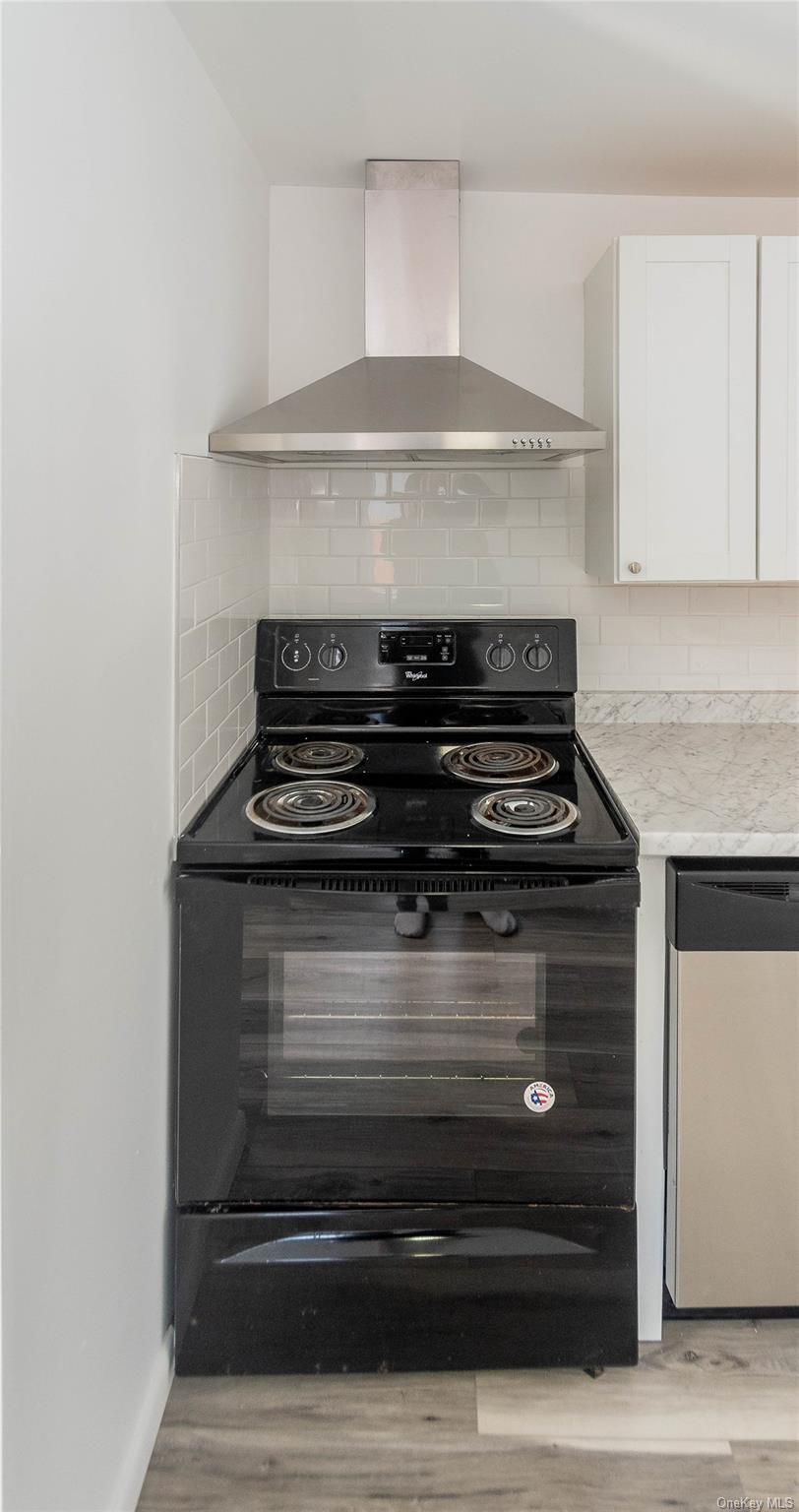 112 State Rte 55 Napanoch, NY 12458 - Photo 19 of 42 a stove top oven sitting inside of a kitchen