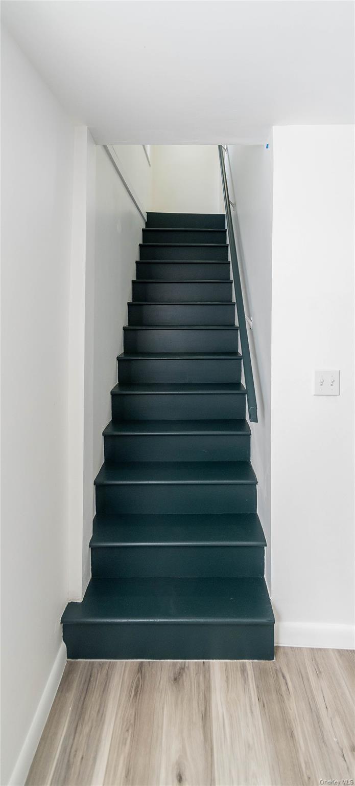 112 State Rte 55 Napanoch, NY 12458 - Photo 23 of 42 Staircase featuring wood finished floors and baseboards