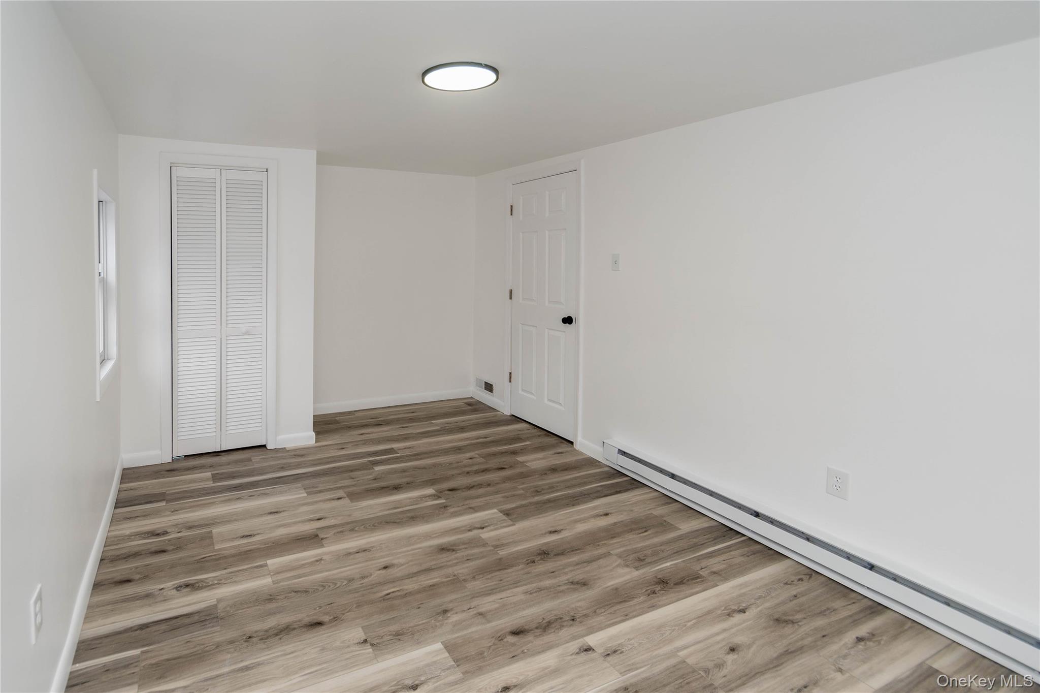 112 State Rte 55 Napanoch, NY 12458 - Photo 31 of 42 a view of a room with wooden floor