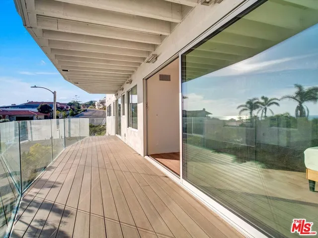 a bathroom with a toilet a sink and bathtub