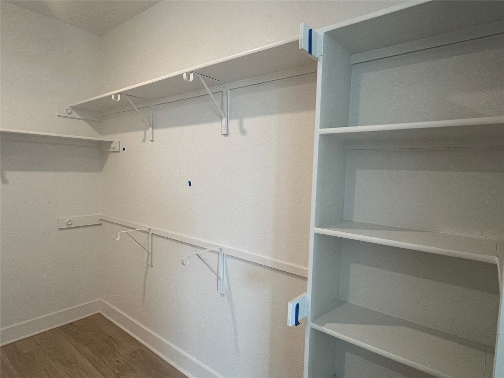 1507 Corsac Way Austin, TX 78758 - Photo 11 of 14 a view of an empty walk in closet