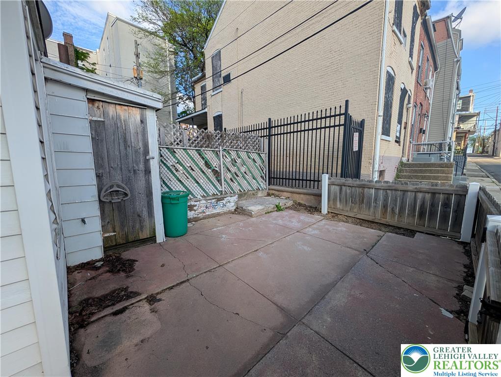 723 Chestnut Street Allentown, PA 18102 - Photo 14 of 25 a view of a pathway with a building in the background