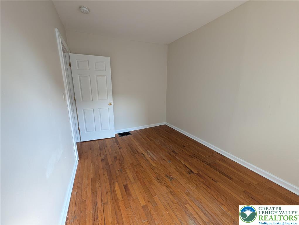 723 Chestnut Street Allentown, PA 18102 - Photo 15 of 25 a view of wooden floor in an empty room