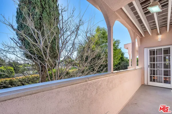 a view of a balcony with an outdoor space