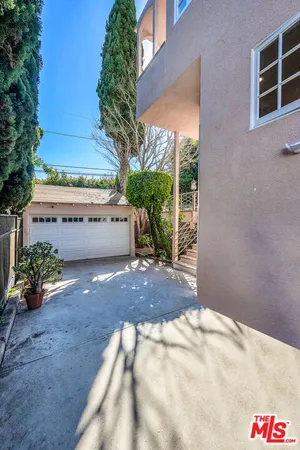 a view of a backyard of the house