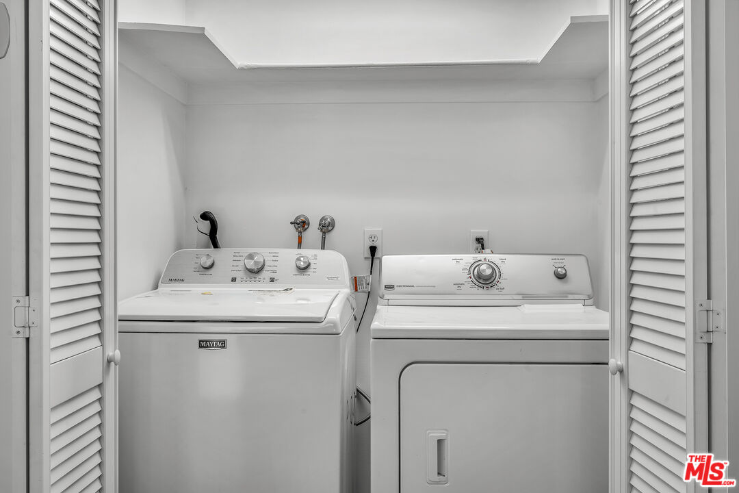 10810 Rochester Avenue Los Angeles, CA 90024 - Photo 32 of 33 a utility room with dryer and washer