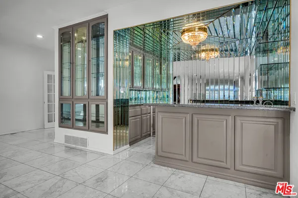 a bathroom with a tub and shower