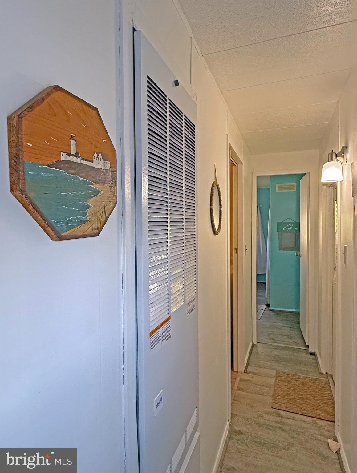 38306 Squirrel Road, Unit 217 Ocean View, DE 19970 - Photo 16 of 28 a view of a door and wooden floor