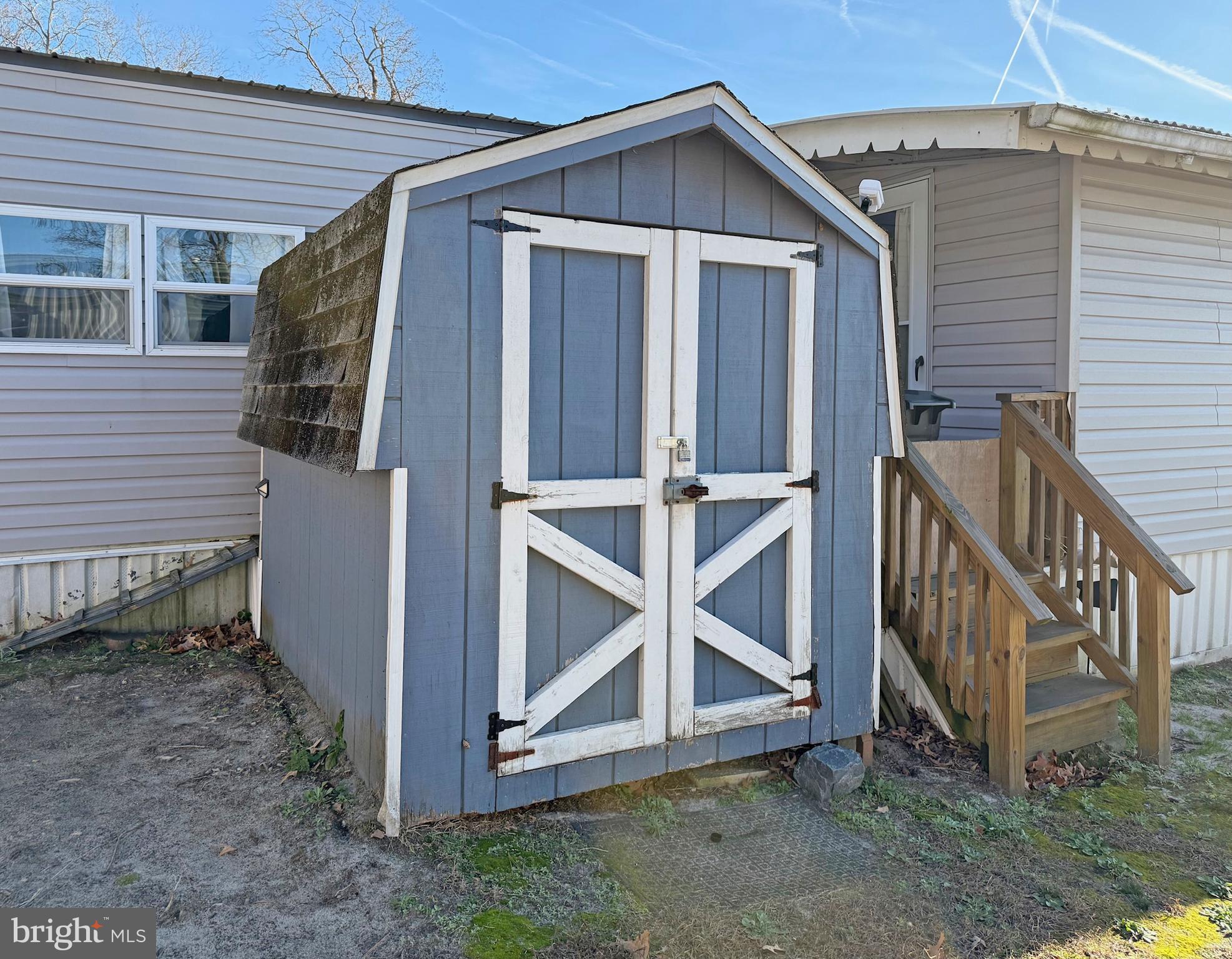 38306 Squirrel Road, Unit 217 Ocean View, DE 19970 - Photo 20 of 28 a view of backyard with small cabin