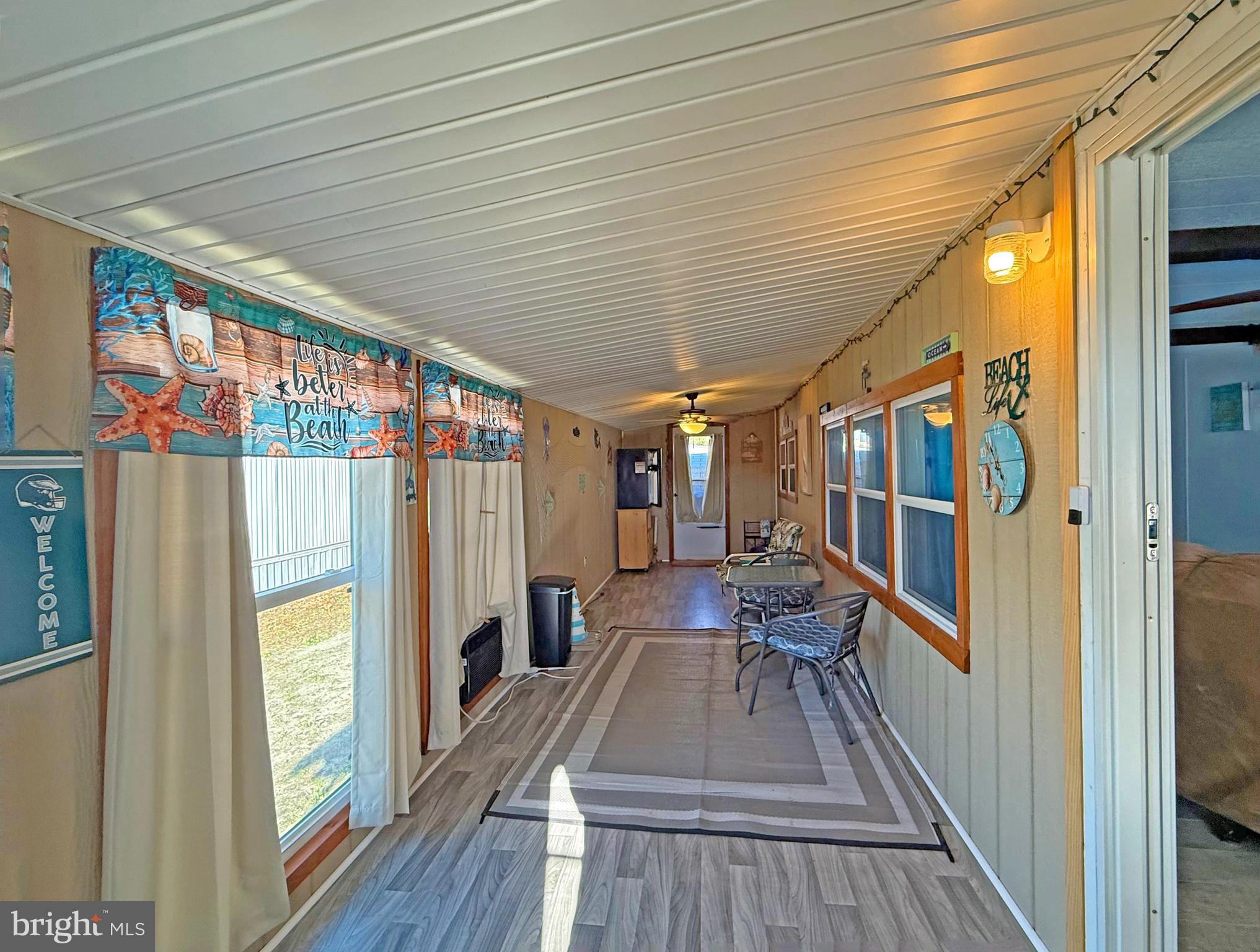 38306 Squirrel Road, Unit 217 Ocean View, DE 19970 - Photo 2 of 28 a view of entryway with wooden floor