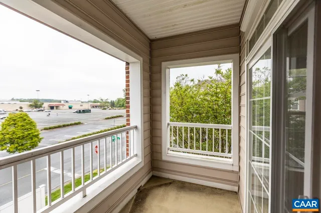 a view of a balcony with city view