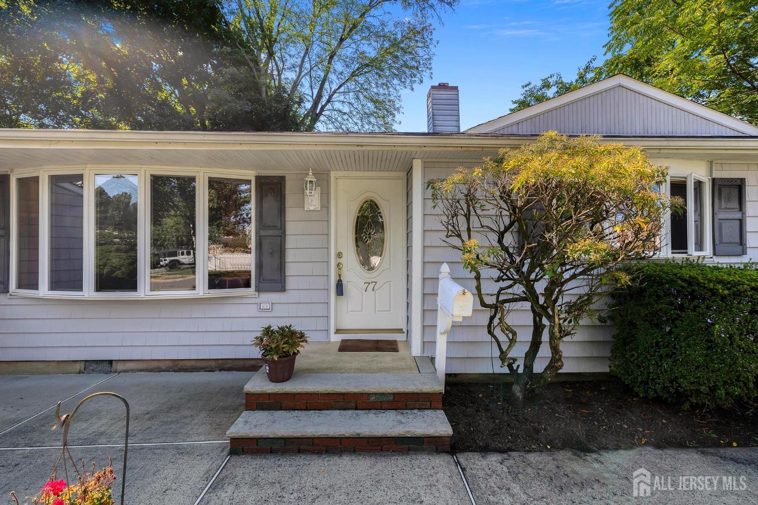77 Albemarle Road Colonia, NJ 07067 - Photo 6 of 30 a front view of a house