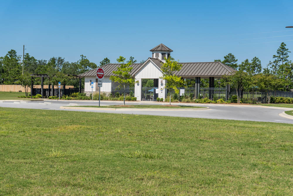 202 Laurel Hill Street Crestview, FL 32539 - Photo 19 of 25 a front view of a house with a yard