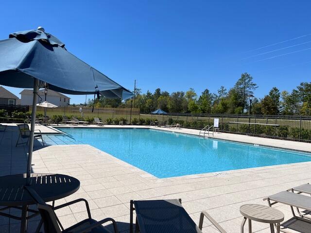 202 Laurel Hill Street Crestview, FL 32539 - Photo 20 of 25 a view of a lake from a balcony
