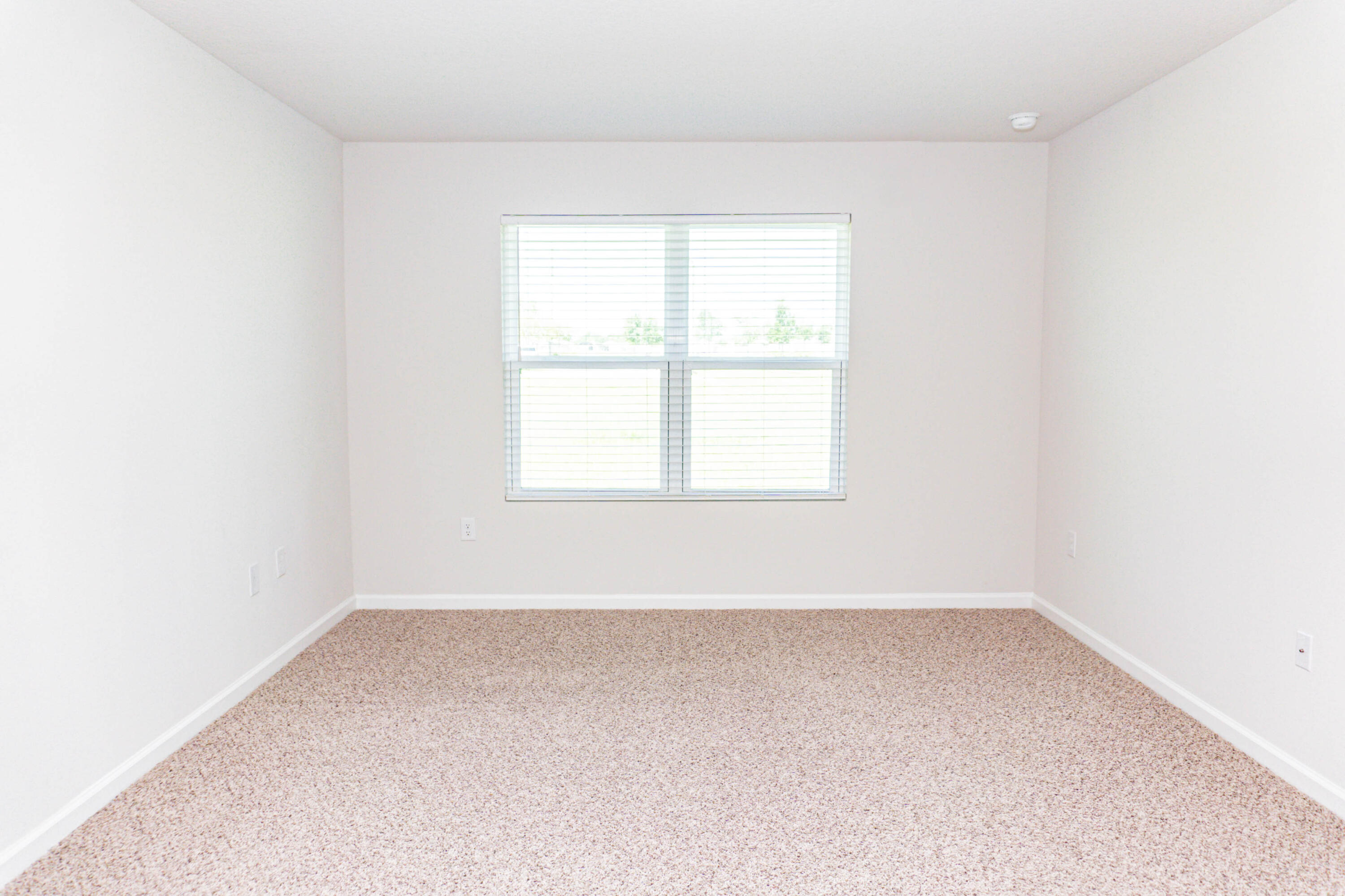 202 Laurel Hill Street Crestview, FL 32539 - Photo 7 of 25 an empty room with a window