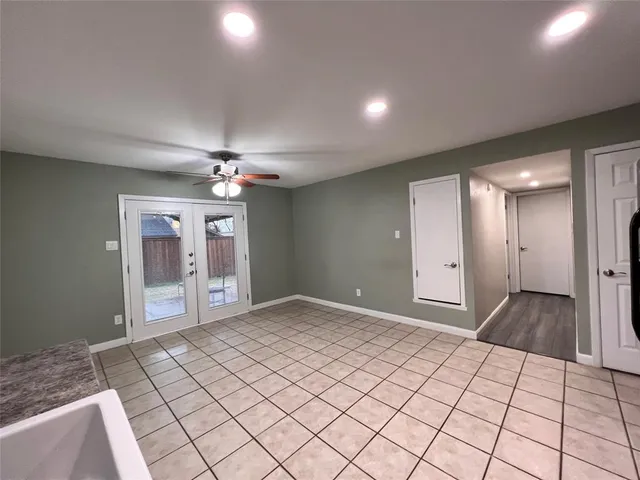 a view of hallway with wooden floor