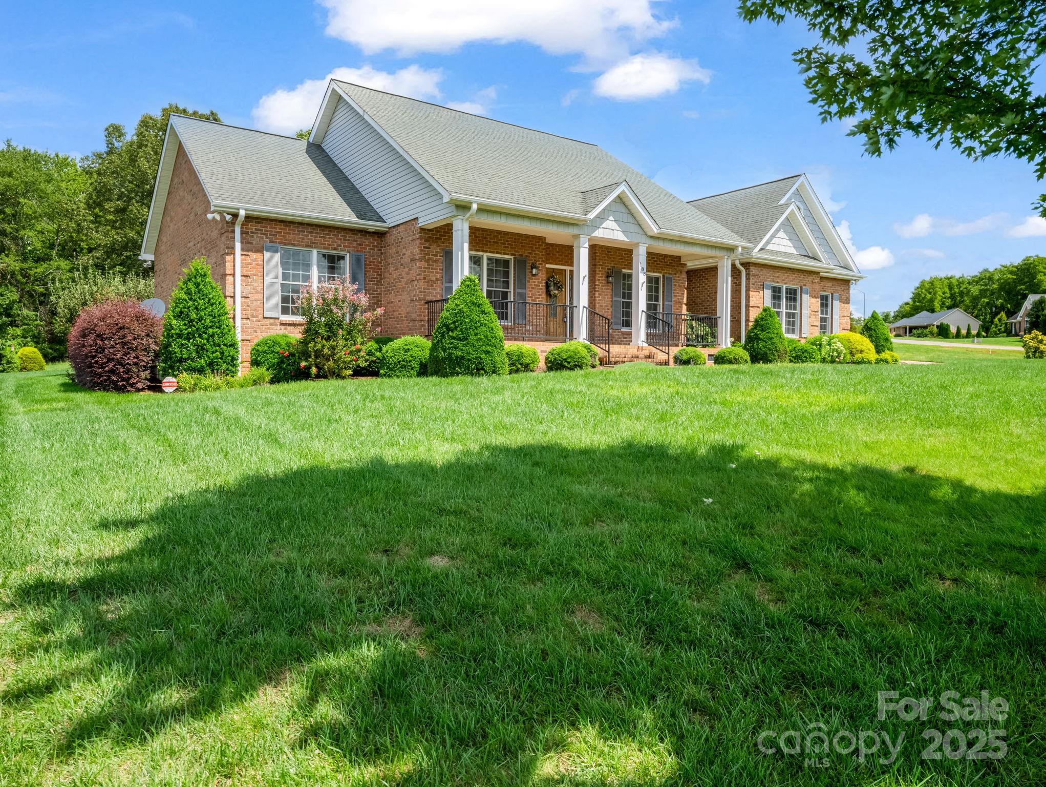 188 Jamesfield Drive Rutherfordton, NC 28139 - Photo 1 of 45 a front view of a house with a garden