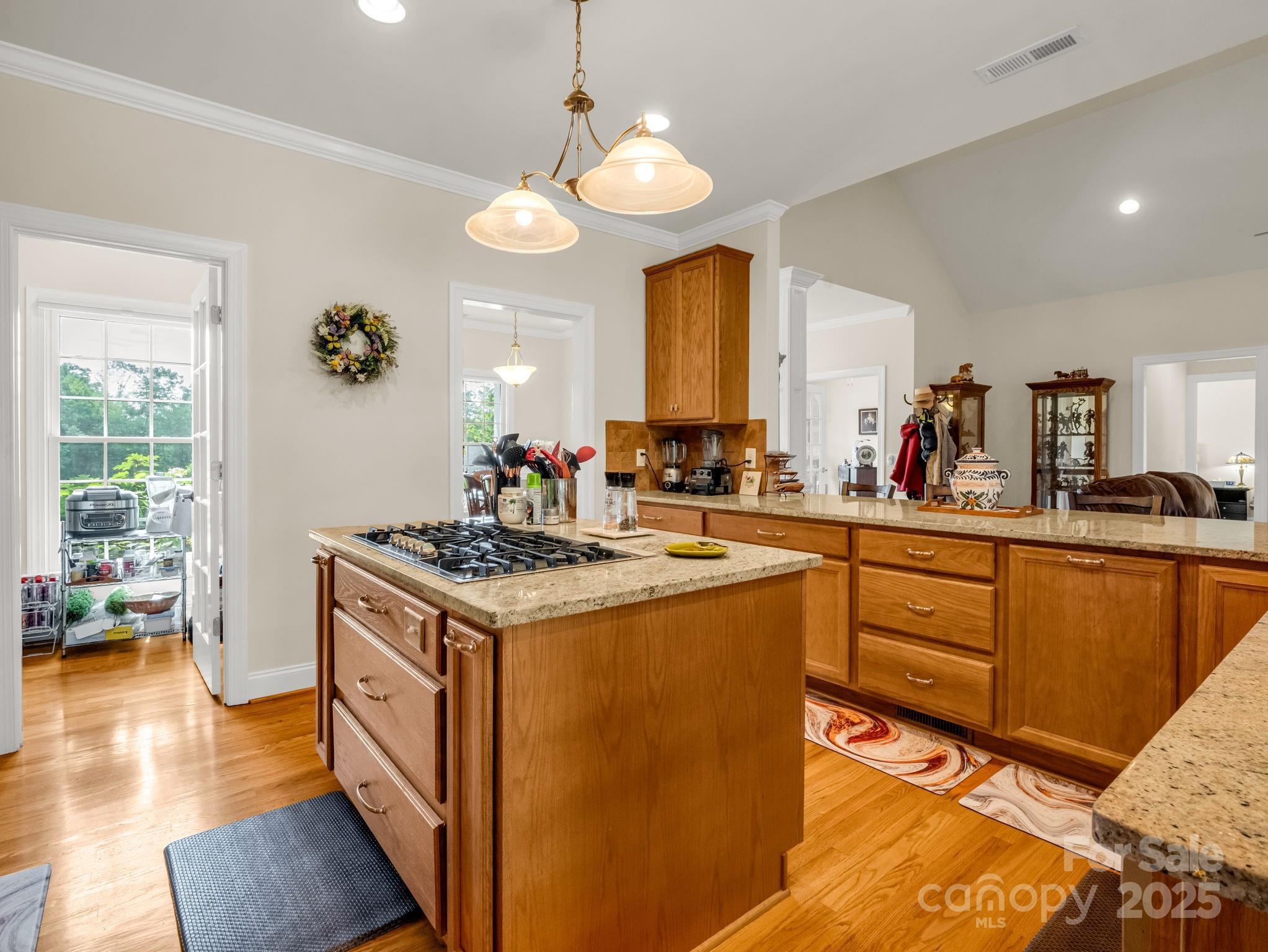 188 Jamesfield Drive Rutherfordton, NC 28139 - Photo 13 of 45 a kitchen with a stove cabinets and wooden floor