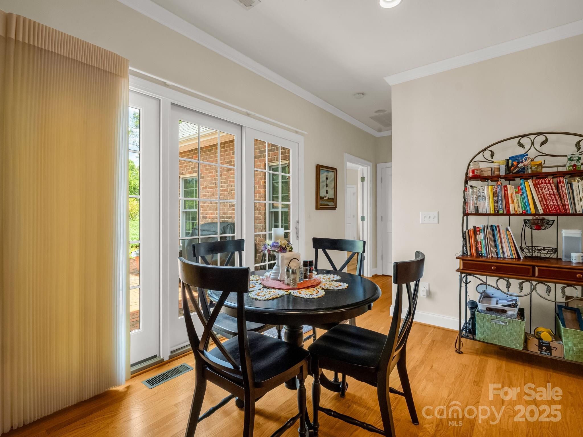188 Jamesfield Drive Rutherfordton, NC 28139 - Photo 20 of 45 a view of a dining room with furniture and a book shelf