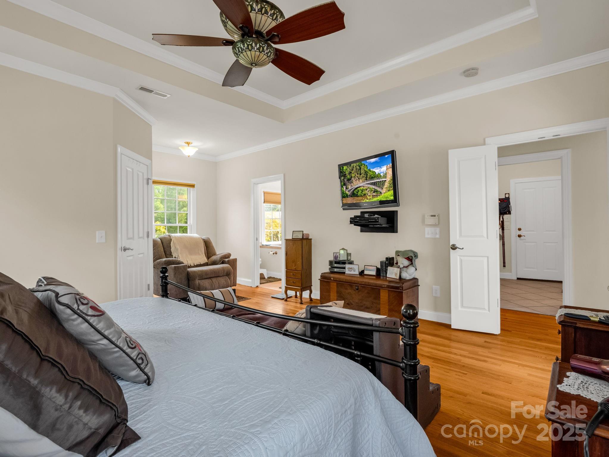 188 Jamesfield Drive Rutherfordton, NC 28139 - Photo 26 of 45 a bedroom with a bed and wooden floor