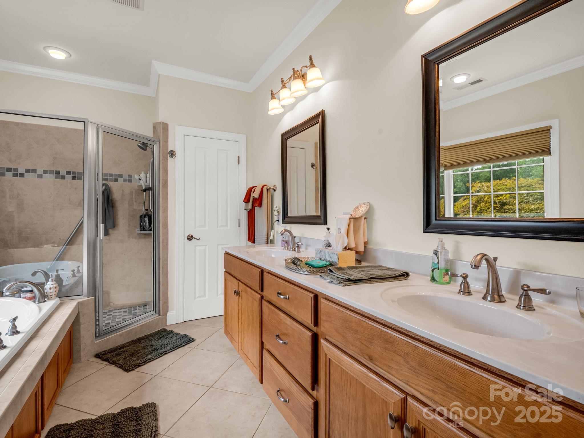 188 Jamesfield Drive Rutherfordton, NC 28139 - Photo 30 of 45 a spacious bathroom with a granite countertop sink mirror and shower