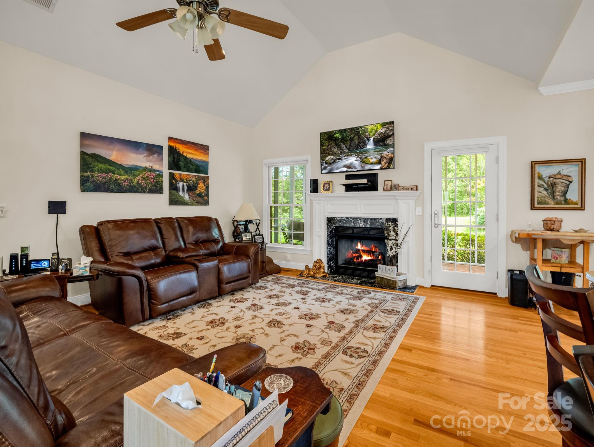 188 Jamesfield Drive Rutherfordton, NC 28139 - Photo 9 of 45 a living room with furniture and a fireplace