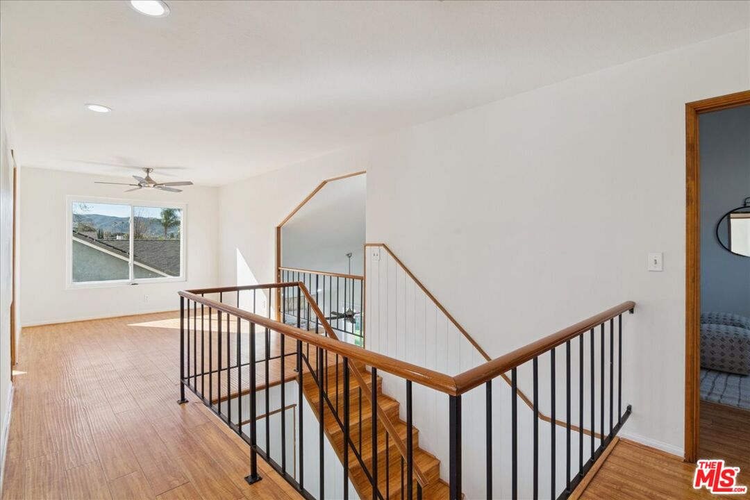 2216 Carlsbad Court Simi Valley, CA 93063 - Photo 24 of 32 a view of staircase with railing and a rug