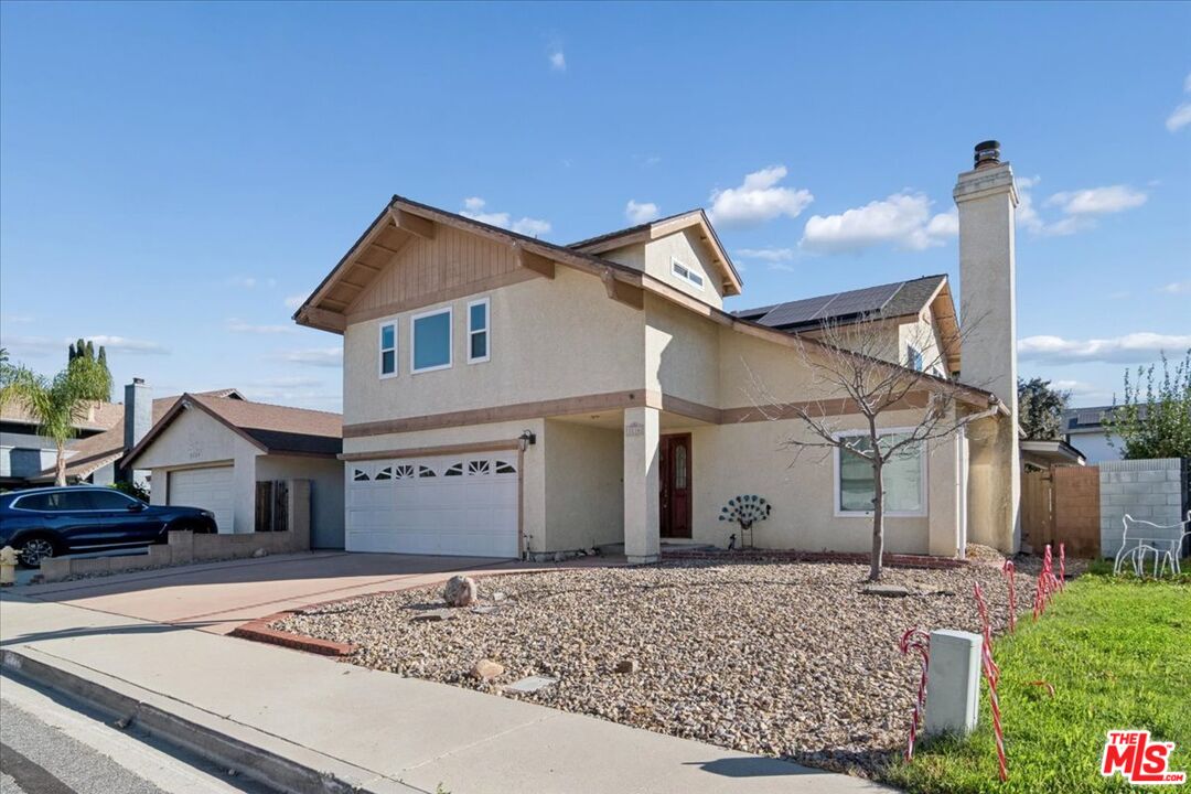 2216 Carlsbad Court Simi Valley, CA 93063 - Photo 32 of 32 a front view of a house with garage