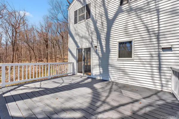 a view of backyard with deck