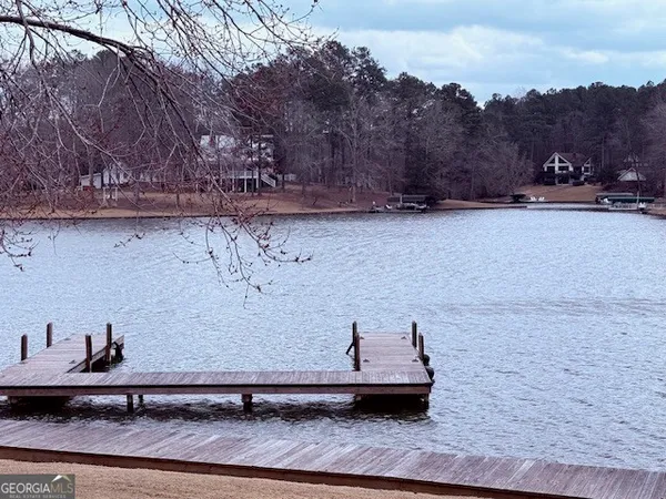 a kitchen with a sink cabinets and window