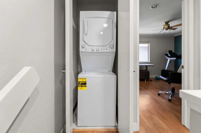 a utility room with dryer and washer