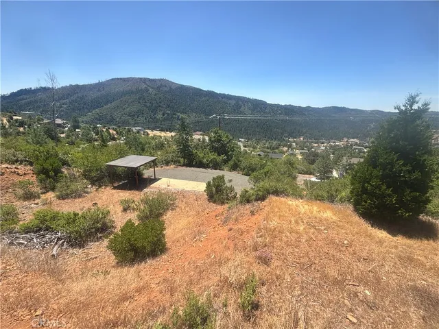 a view of a mountain with a garden