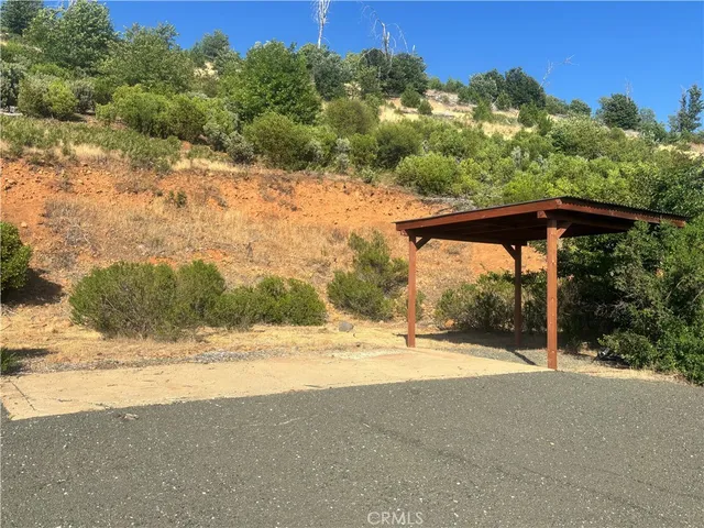 a view of swimming pool with a yard